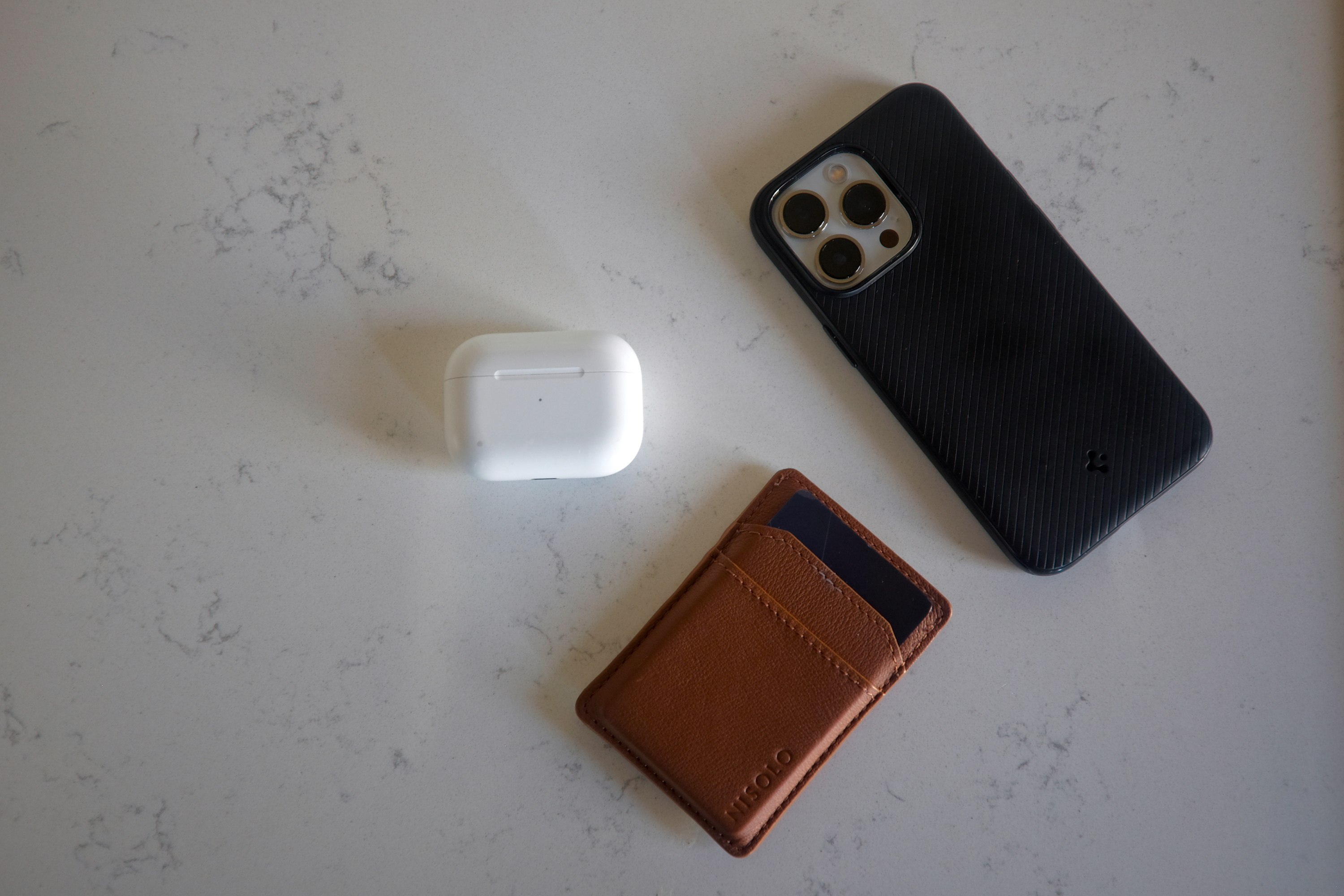 15 Smart Hacks to Avoid Baggage Fees by Traveling with Just a Personal Item Travel essentials: phone, wallet, earbuds
